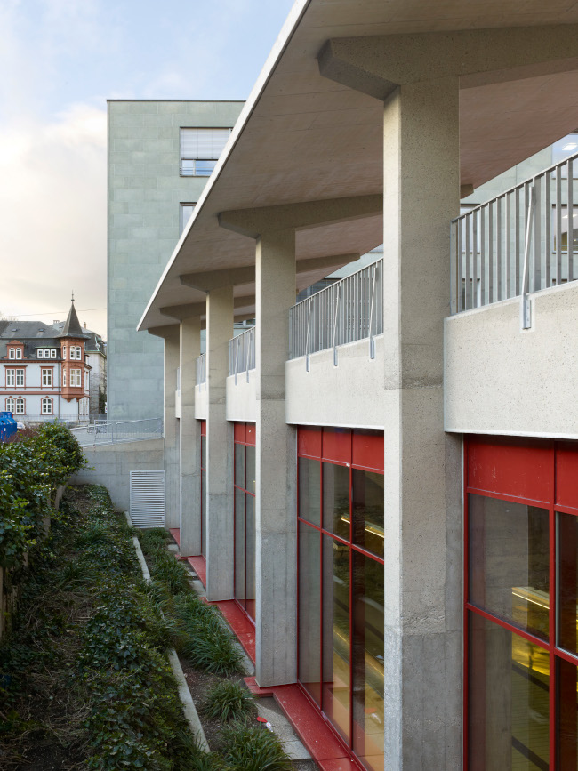 New facade with grandstand roof