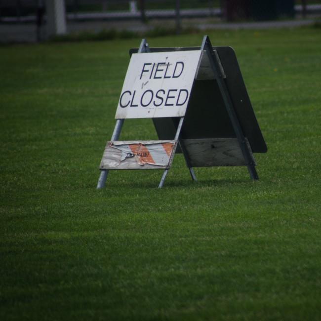 Unsplash ryan-stone-fhWwpyVRRXM-Field closed sign 650.jpg